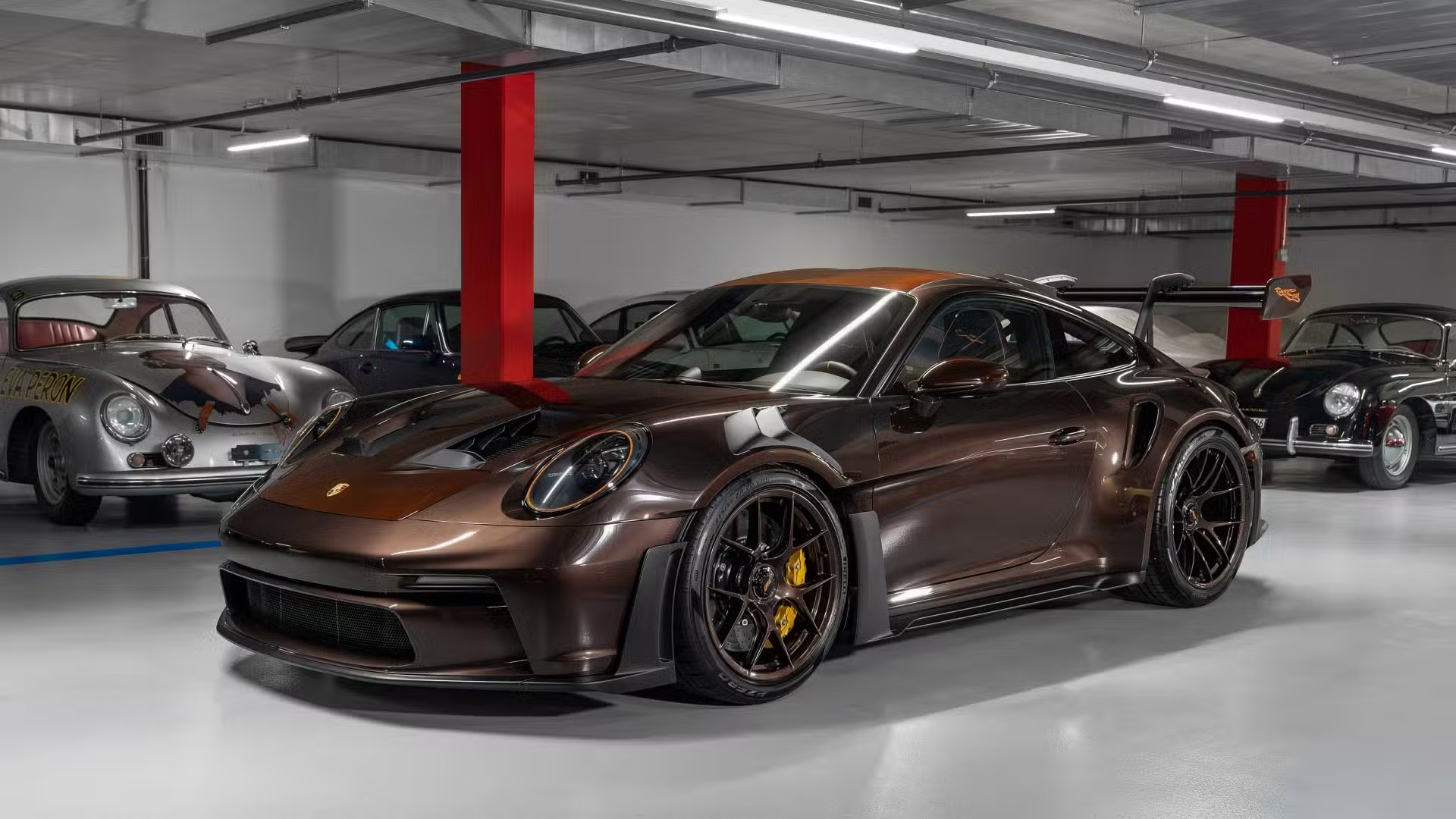 2025-porsche-911-gt3-rs-sonderwunsch-macadamia-brown-exterior-front-quarter.jpeg