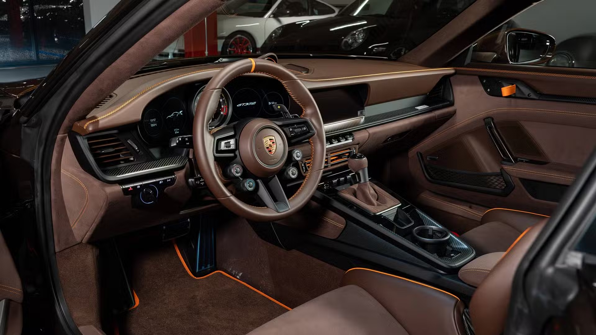 2025-porsche-911-gt3-rs-sonderwunsch-macadamia-brown-interior-dashboard.jpeg