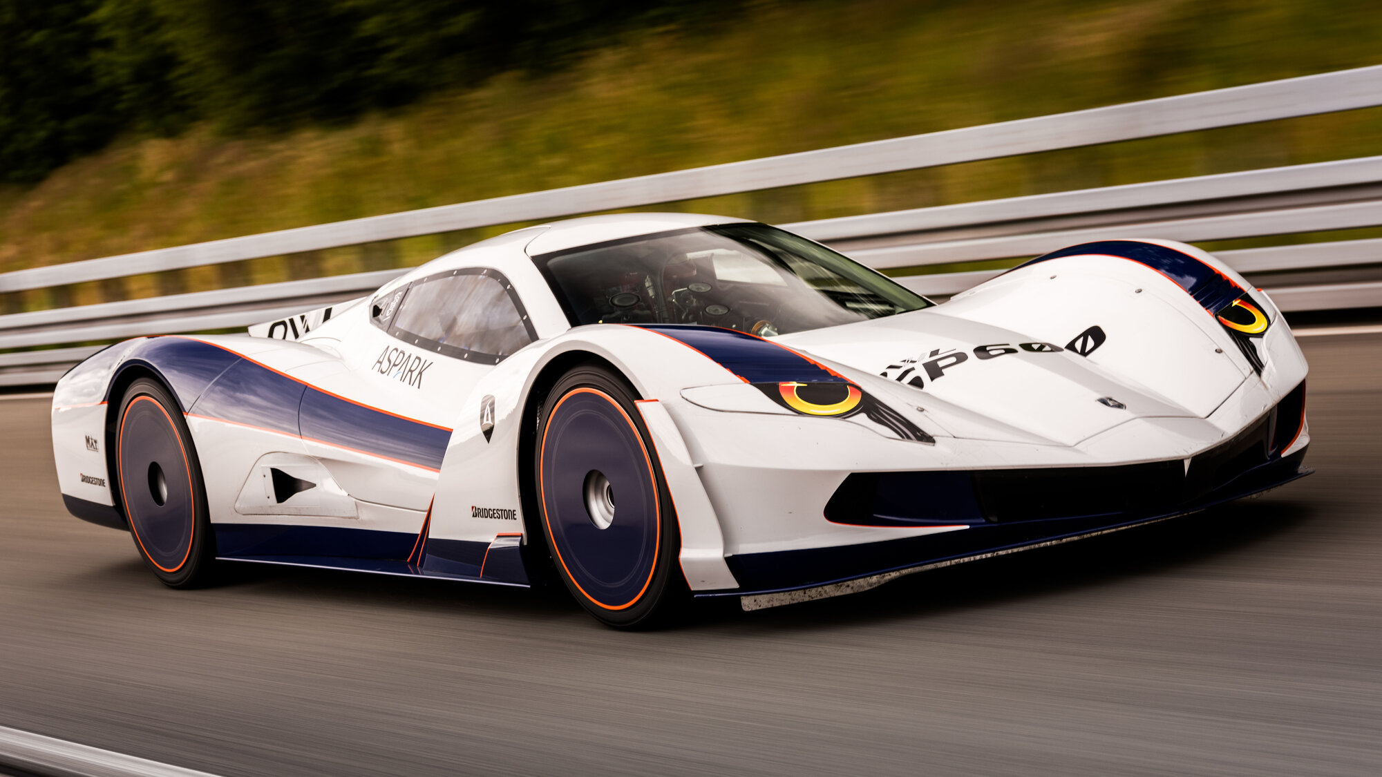Aspark OWL SP600 hypercar moving at spoeed on track . It set a new electric car speed world re...jpg