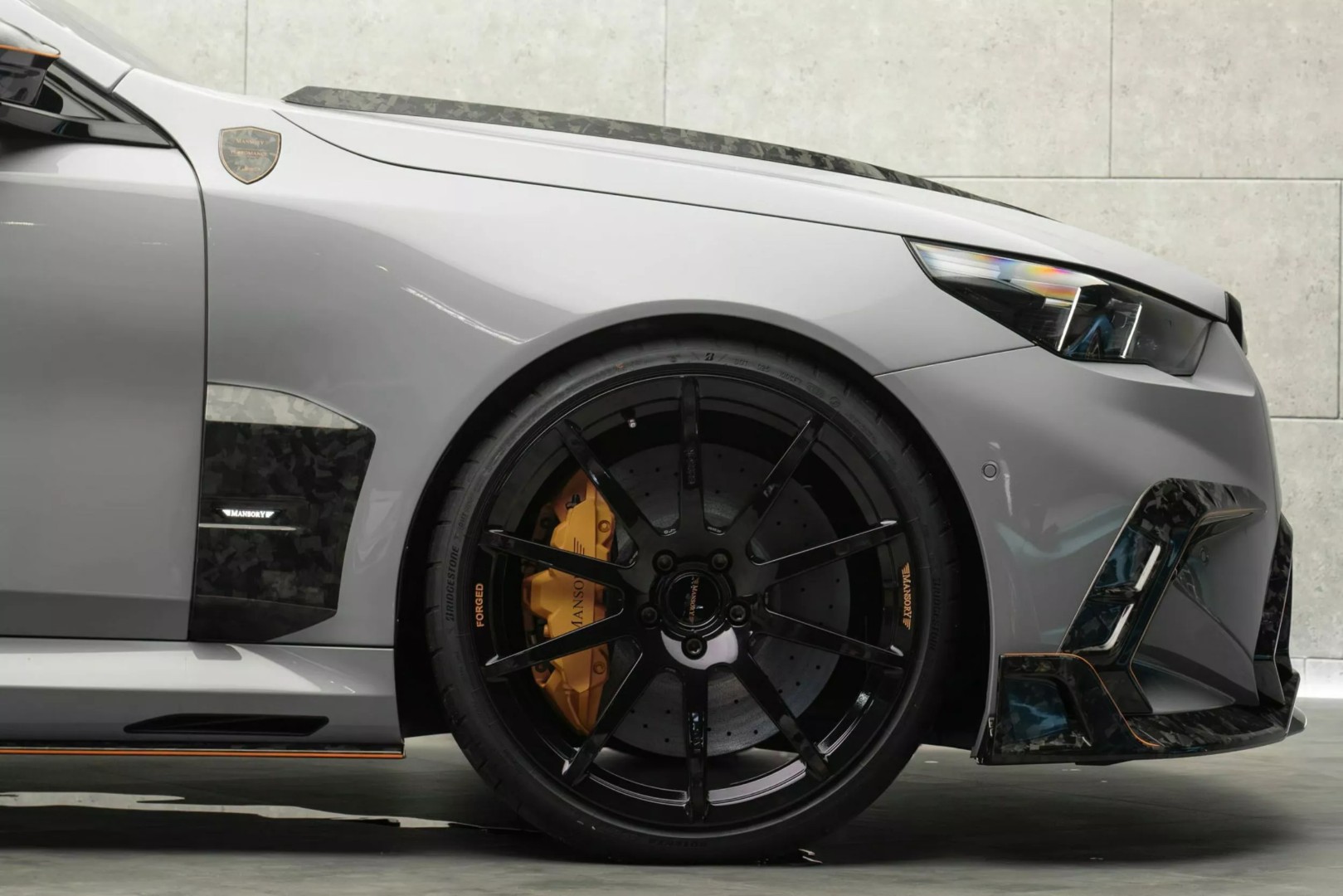 BMW-M5-Tuned-By-Mansory-7 (Large).jpeg