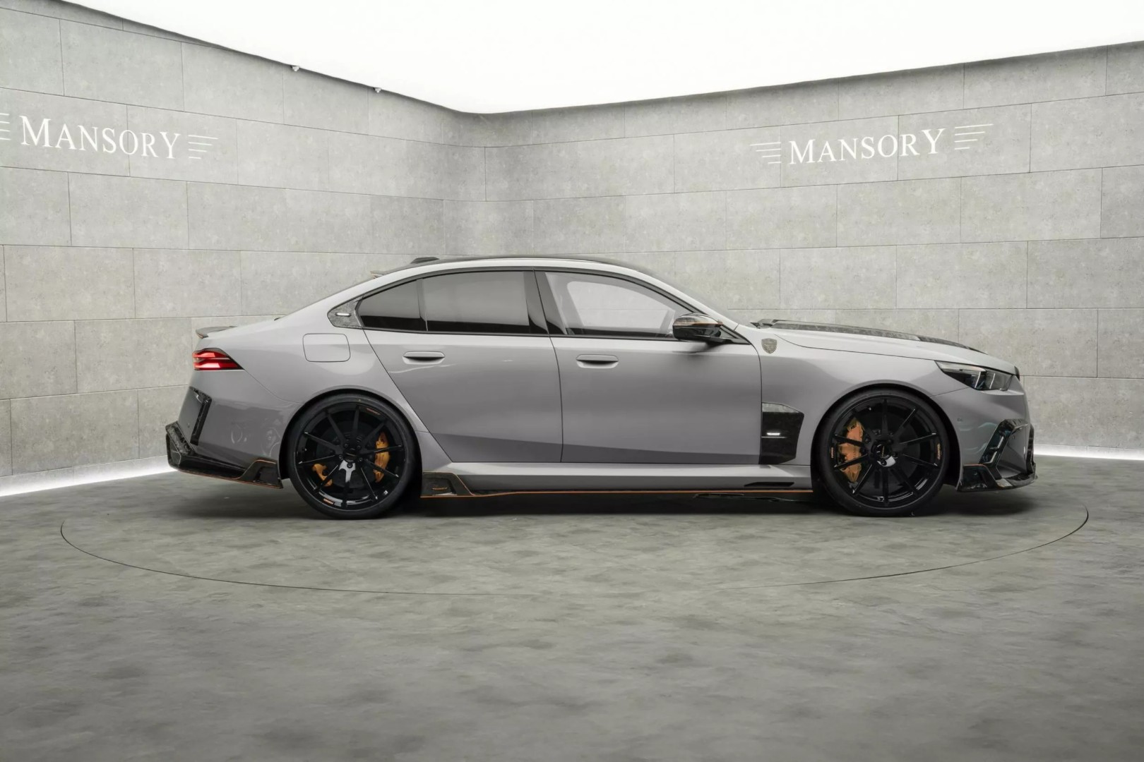BMW-M5-Tuned-By-Mansory-8 (Large).jpeg