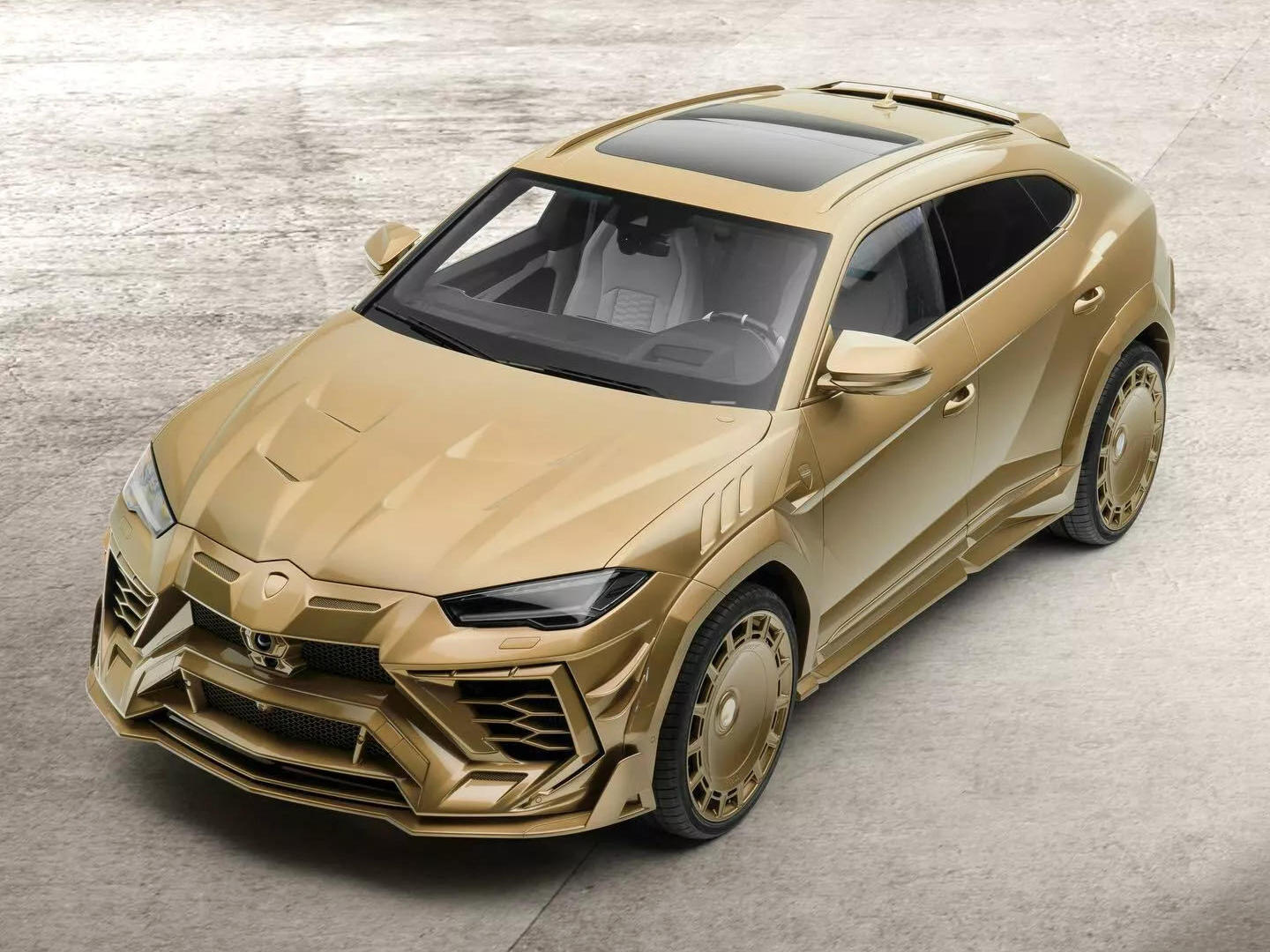 Lamborghini-Urus-Mansory-venatus-gold-00.jpg