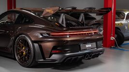 2025-porsche-911-gt3-rs-sonderwunsch-macadamia-brown-exterior-rear-spoiler.jpeg