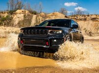 2027-jeep-grand-cherokee-trailhawk-in-black-front-angled-view-water-driving.jpeg